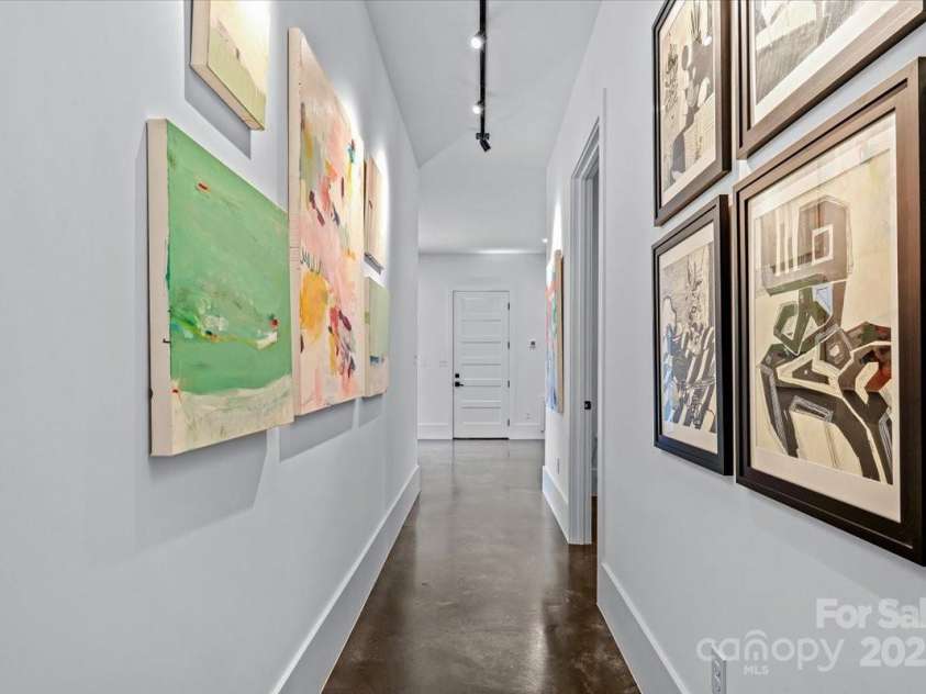 3304 Mar Vista Circle, Charlotte, NC 28209.  MLS# CAR4269142, YatesRealty ID 23531. Gallery hall features track lighting to highlight your favorite pieces