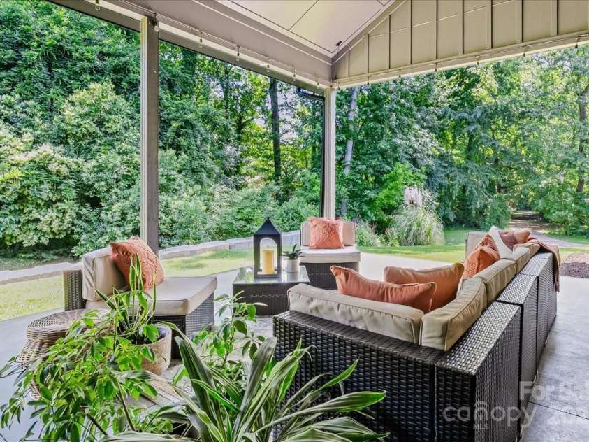 3304 Mar Vista Circle, Charlotte, NC 28209.  MLS# CAR4269142, YatesRealty ID 23531. Porch overlooks natural spring fed pond with year round wildlife: turtles, cranes, herons, ducks, geese, and deer