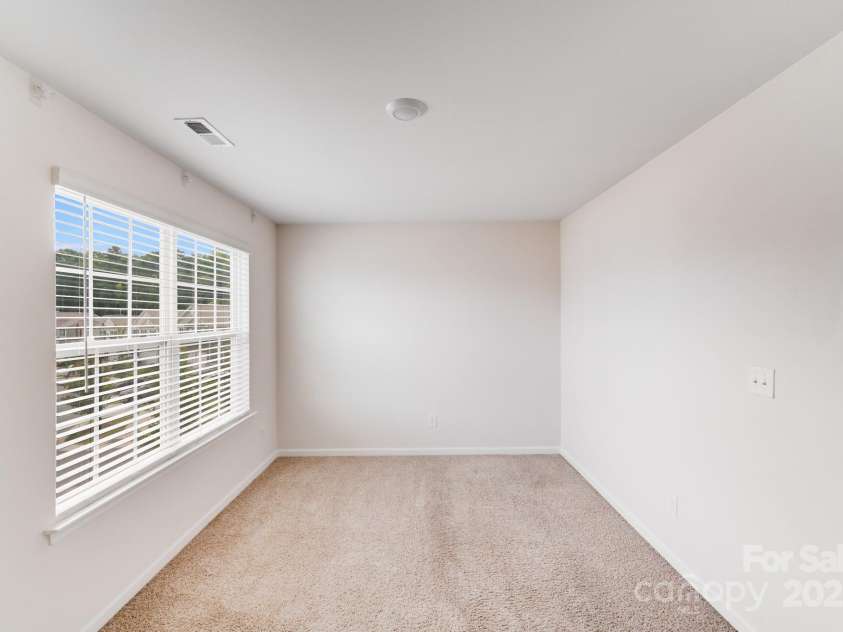 7205 Finnigan Road, Charlotte, NC 28215.  MLS# CAR4257319, YatesRealty ID 23532. Bedroom 3 w/ double hung windows
