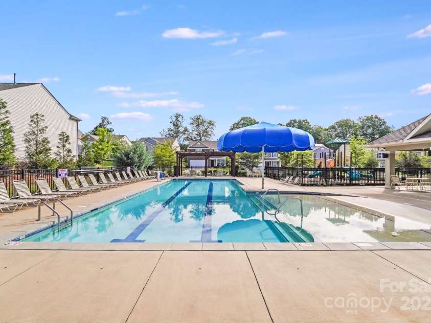 7205 Finnigan Road, Charlotte, NC 28215.  MLS# CAR4257319, YatesRealty ID 23532. Olympic Sized lap pool