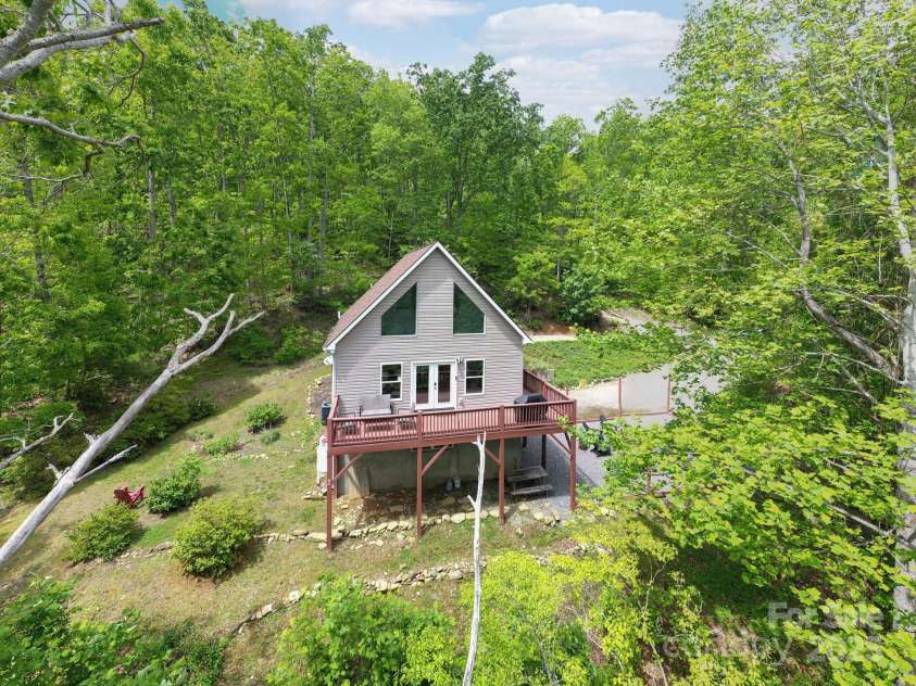 25 Licklog Ridge Road, Fairview, NC 28730.  MLS# CAR4256398, YatesRealty ID 23533. Meander Your Way to a Private Retreat on the Top of the Mountain