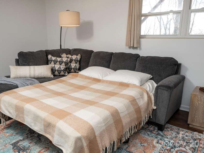 25 Licklog Ridge Road, Fairview, NC 28730.  MLS# CAR4256398, YatesRealty ID 23533. Pull Out Sofa for Extra Sleeping