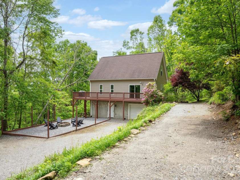 25 Licklog Ridge Road, Fairview, NC 28730.  MLS# CAR4256398, YatesRealty ID 23533. Rear View with Plenty of Parking and One-Car Garage