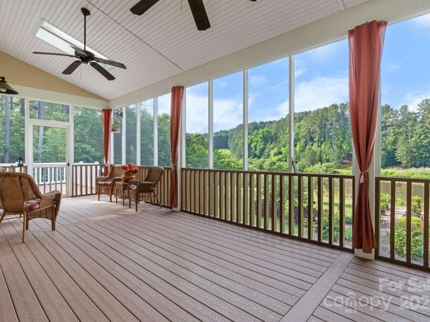 5487 Back Shore Drive, Granite Falls, NC 28630.  MLS# CAR4263403, YatesRealty ID 23534. Screen in porch with skylights