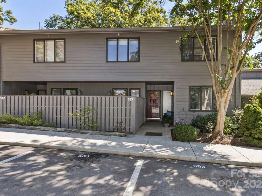 503 Crowfields Lane, Asheville, NC 28803.  MLS# CAR4269108, YatesRealty ID 23540. Gray exterior elevation for 503 Crowfields