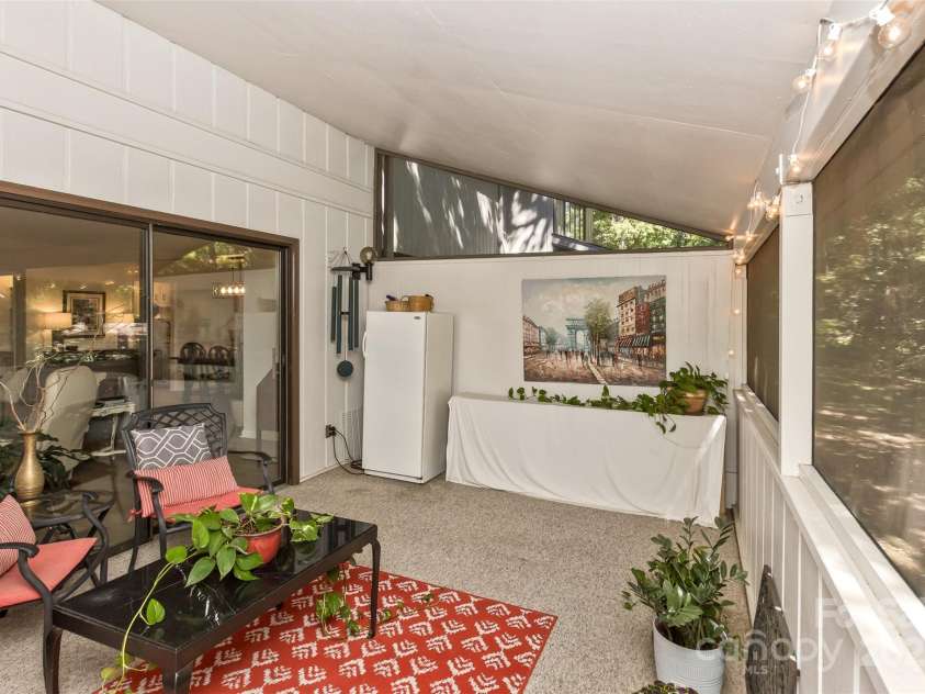 503 Crowfields Lane, Asheville, NC 28803.  MLS# CAR4269108, YatesRealty ID 23540. Screened porch