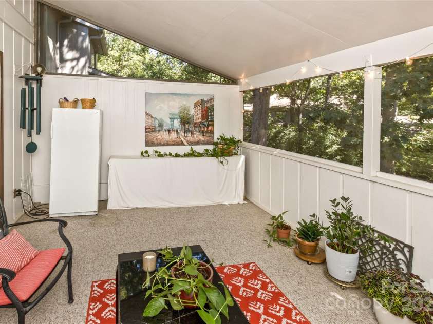 503 Crowfields Lane, Asheville, NC 28803.  MLS# CAR4269108, YatesRealty ID 23540. Screened porch