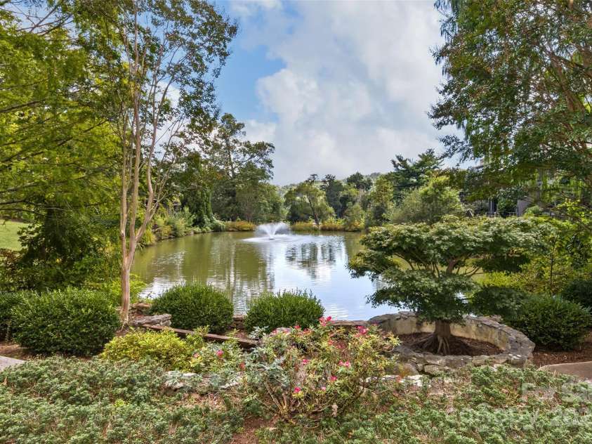 503 Crowfields Lane, Asheville, NC 28803.  MLS# CAR4269108, YatesRealty ID 23540. View of the lake and the trails