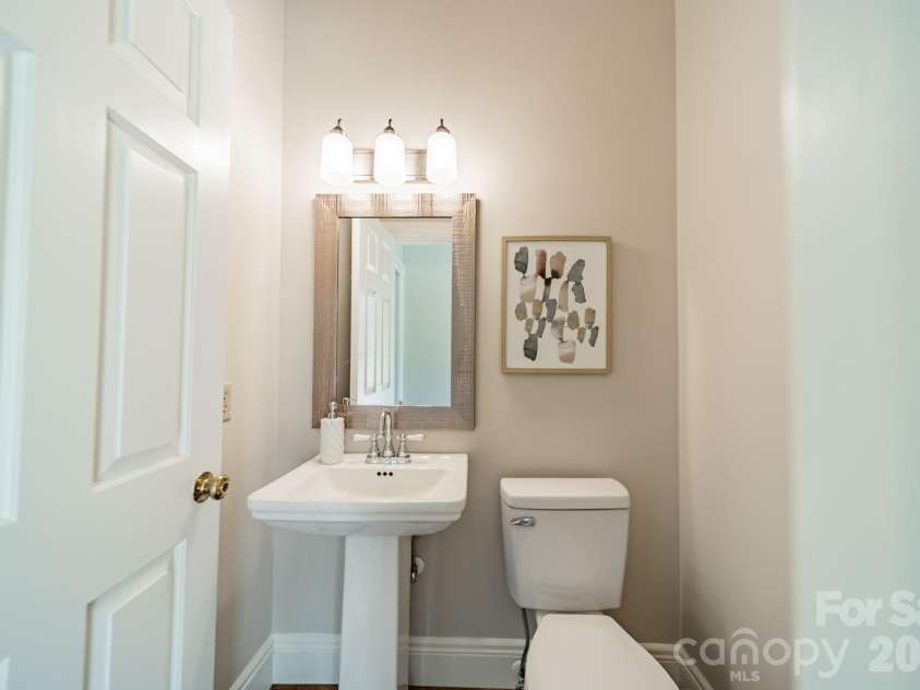 4030 Oak Hollow Lane, Harrisburg, NC 28075.  MLS# CAR4379031, YatesRealty ID 23541. Half-bath
