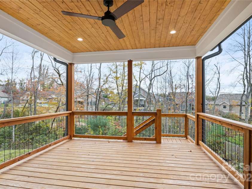 127 Creekside Valley Lane, Arden, NC 28704.  MLS# CAR4317956, YatesRealty ID 23544. Covered Rear Porch/Deck