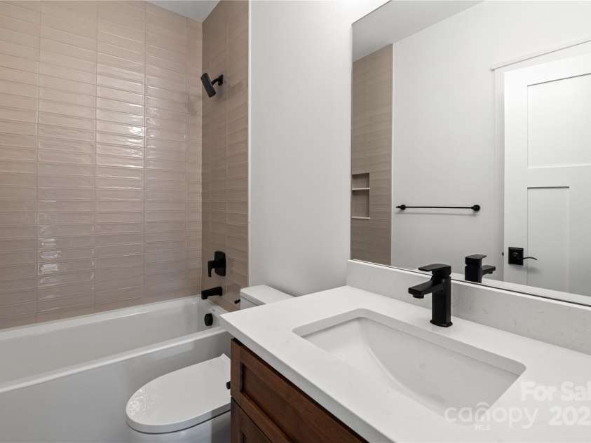 127 Creekside Valley Lane, Arden, NC 28704.  MLS# CAR4317956, YatesRealty ID 23544. Guest Bath