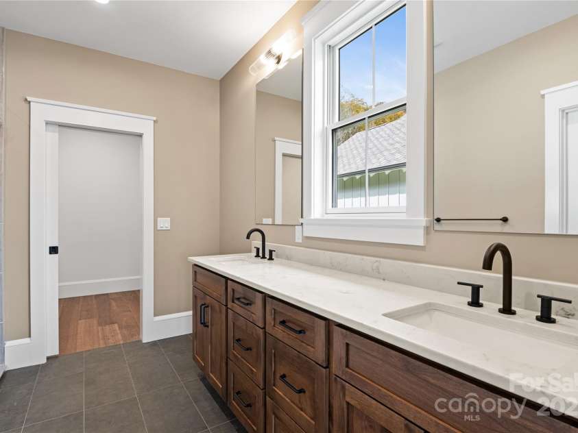 127 Creekside Valley Lane, Arden, NC 28704.  MLS# CAR4317956, YatesRealty ID 23544. Owner's Bath