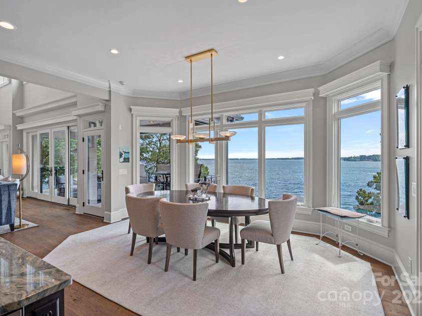 18007 Harbor Light Boulevard, Cornelius, NC 28031.  MLS# CAR4271847, YatesRealty ID 23544. Spacious Breakfast Area Open to Great Room and Kitchen facing South West for evening sunset views.