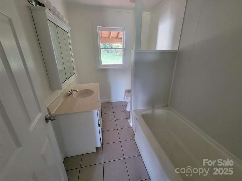 317 Poplar Street, Canton, NC 28716.  MLS# CAR4276377, YatesRealty ID 23546. 