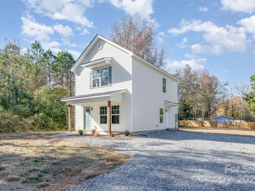 5306 Lee Massey Road, Waxhaw, NC 28173.  MLS# CAR4320023, YatesRealty ID 23549. Enjoy the charm of a covered front porch and the freedom of no HOA on this beautiful 0.58 acre lot.