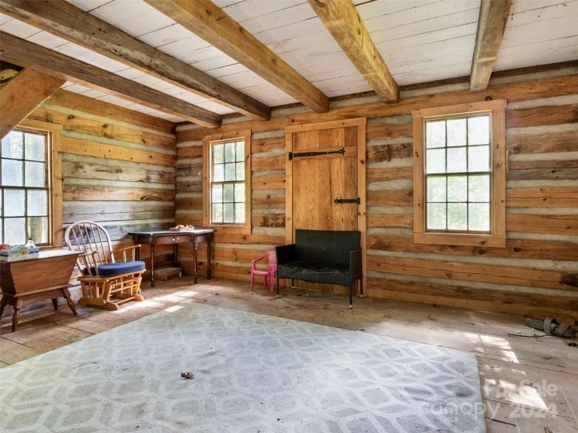 19314 Highway 221 Highway, Marion, NC 28752.  MLS# CAR4162448, YatesRealty ID 2355. Appalachian log cabin.