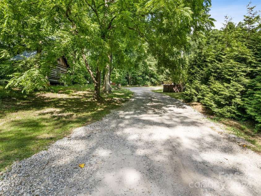 19314 Highway 221 Highway, Marion, NC 28752.  MLS# CAR4162448, YatesRealty ID 2355. Driveway to cabin