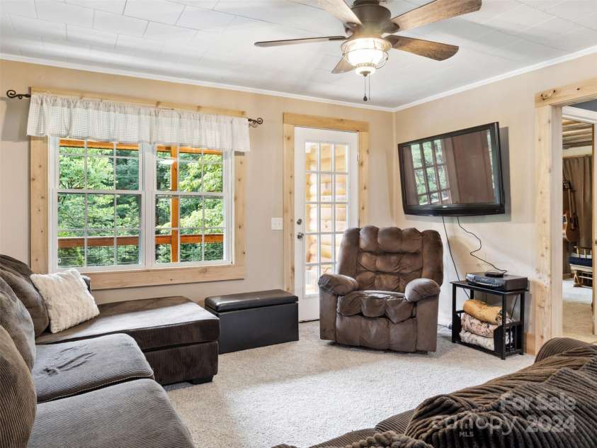 19314 Highway 221 Highway, Marion, NC 28752.  MLS# CAR4162448, YatesRealty ID 2355. Greatroom with entry to front porch