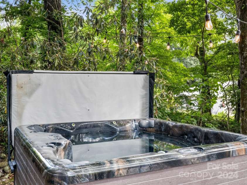 19314 Highway 221 Highway, Marion, NC 28752.  MLS# CAR4162448, YatesRealty ID 2355. Hot tub