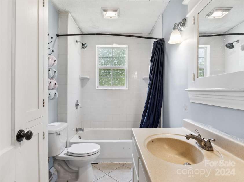 19314 Highway 221 Highway, Marion, NC 28752.  MLS# CAR4162448, YatesRealty ID 2355. Primary bath