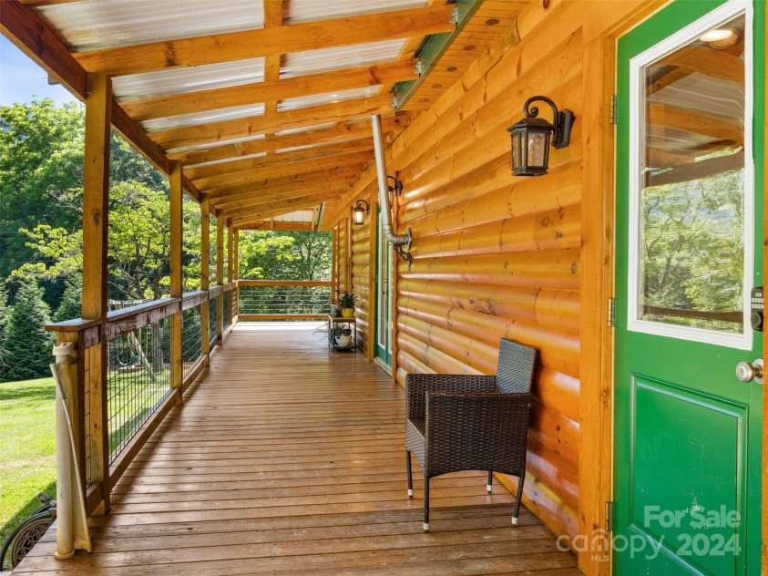 19314 Highway 221 Highway, Marion, NC 28752.  MLS# CAR4162448, YatesRealty ID 2355. Side porch