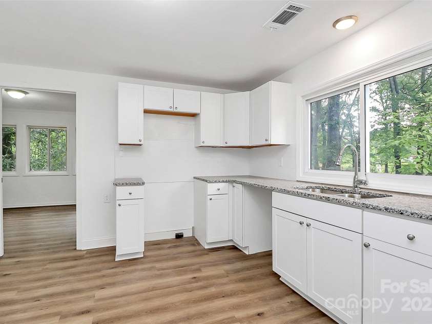 613 Rhyne Street, Gastonia, NC 28054.  MLS# CAR4261115, YatesRealty ID 23552. Fully renovated main floor kitchen