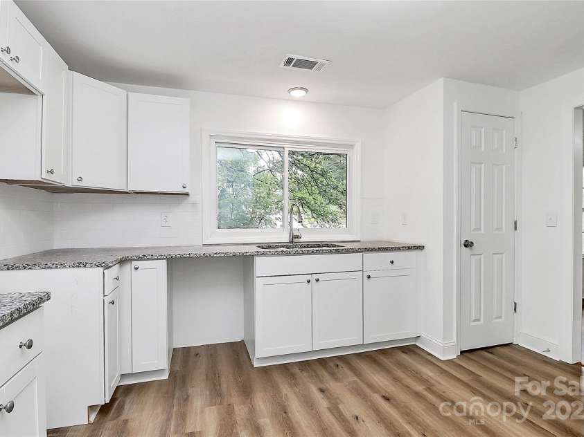 613 Rhyne Street, Gastonia, NC 28054.  MLS# CAR4261115, YatesRealty ID 23552. Fully renovated main floor kitchen