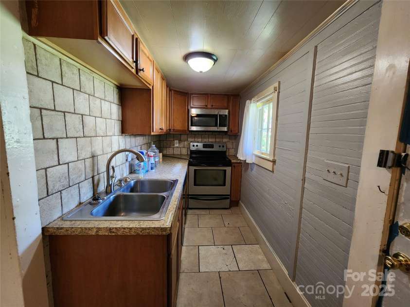 125 Davie Street, Cooleemee, NC 27028.  MLS# CAR4277207, YatesRealty ID 23555. 