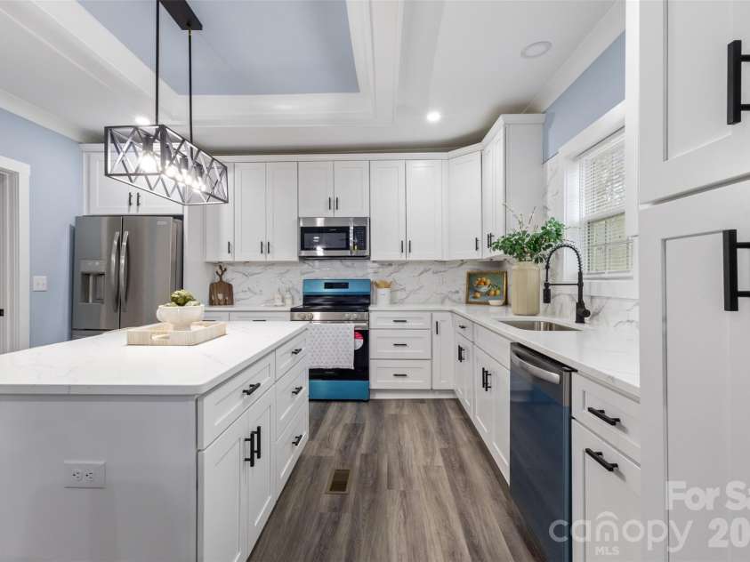 305 Henry Street, Belmont, NC 28012.  MLS# CAR4340496, YatesRealty ID 23556. Beautifully remodeled kitchen with everything new. 