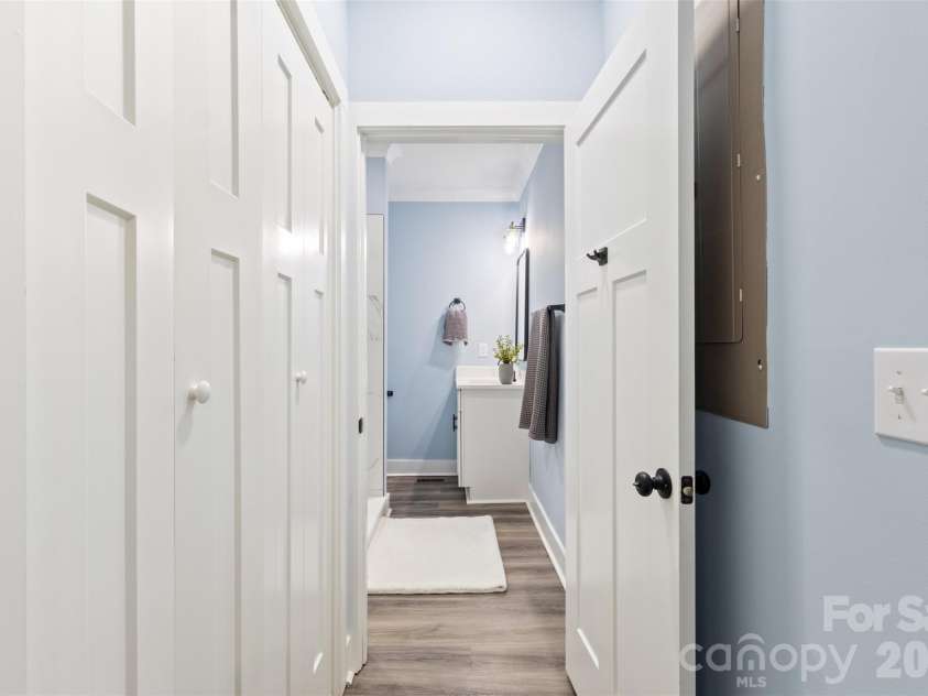 305 Henry Street, Belmont, NC 28012.  MLS# CAR4340496, YatesRealty ID 23556. Entry way into primary en suite bathroom. 