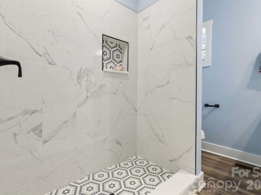 305 Henry Street, Belmont, NC 28012.  MLS# CAR4340496, YatesRealty ID 23556. Primary en suite bathroom w/ beautiful, oversized shower. 