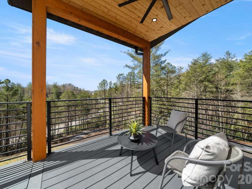74 Jeranna Road, Mills River, NC 28759.  MLS# CAR4354656, YatesRealty ID 23556. Second level open deck