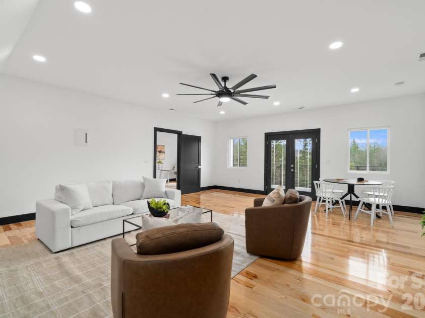 74 Jeranna Road, Mills River, NC 28759.  MLS# CAR4354656, YatesRealty ID 23556. Third level living room, rec room, game room