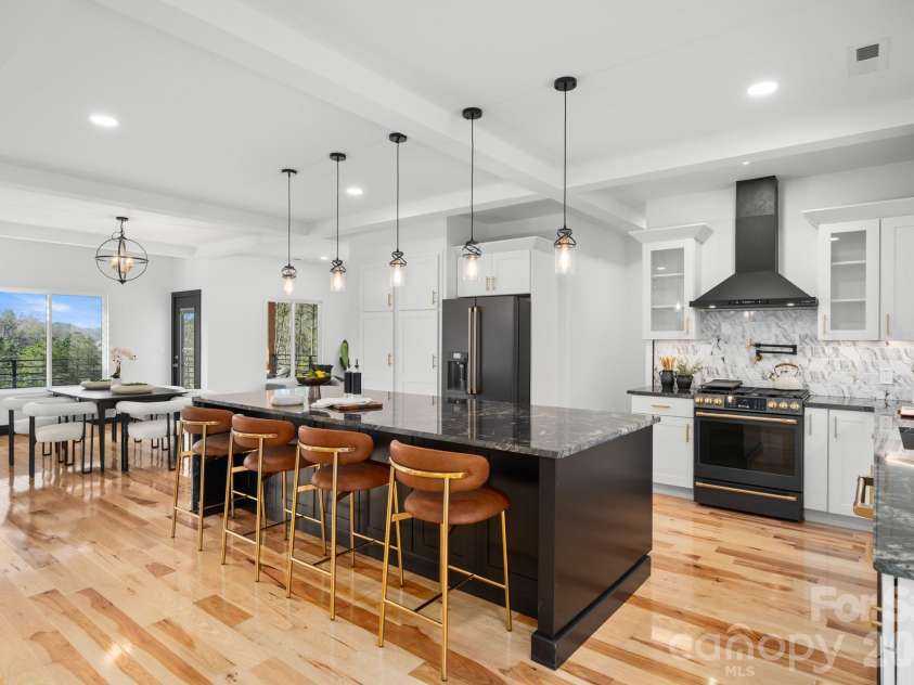 74 Jeranna Road, Mills River, NC 28759.  MLS# CAR4354656, YatesRealty ID 23556. Waterfall kitchen island
