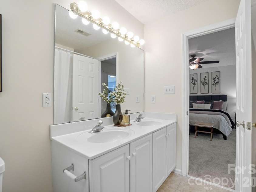 1919 Gables Drive, Monroe, NC 28112.  MLS# CAR4380322, YatesRealty ID 23557. Dual sinks in primary