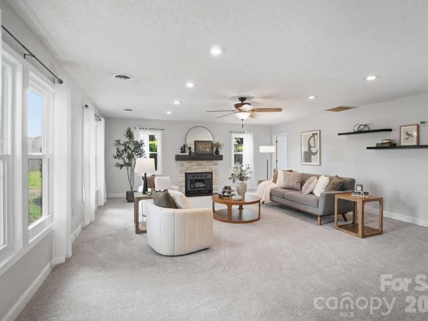 1919 Gables Drive, Monroe, NC 28112.  MLS# CAR4380322, YatesRealty ID 23557. Spacious living room