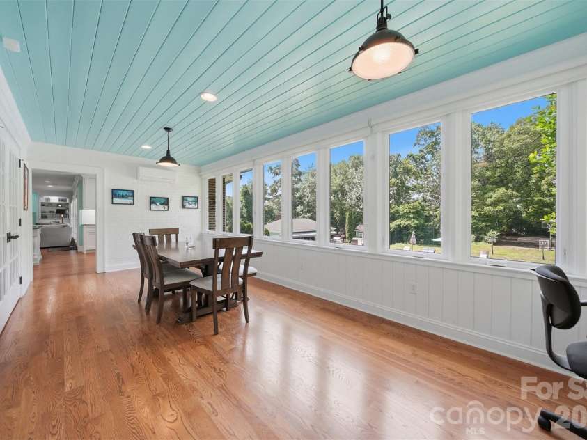 1013 14th Avenue Drive, Hickory, NC 28601.  MLS# CAR4383520, YatesRealty ID 23559. Sunroom has build in desk area