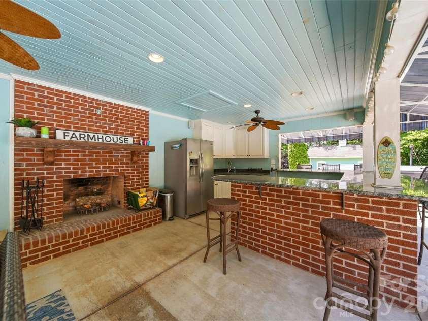1013 14th Avenue Drive, Hickory, NC 28601.  MLS# CAR4383520, YatesRealty ID 23559. Wood Burning FP in Pool Cabana