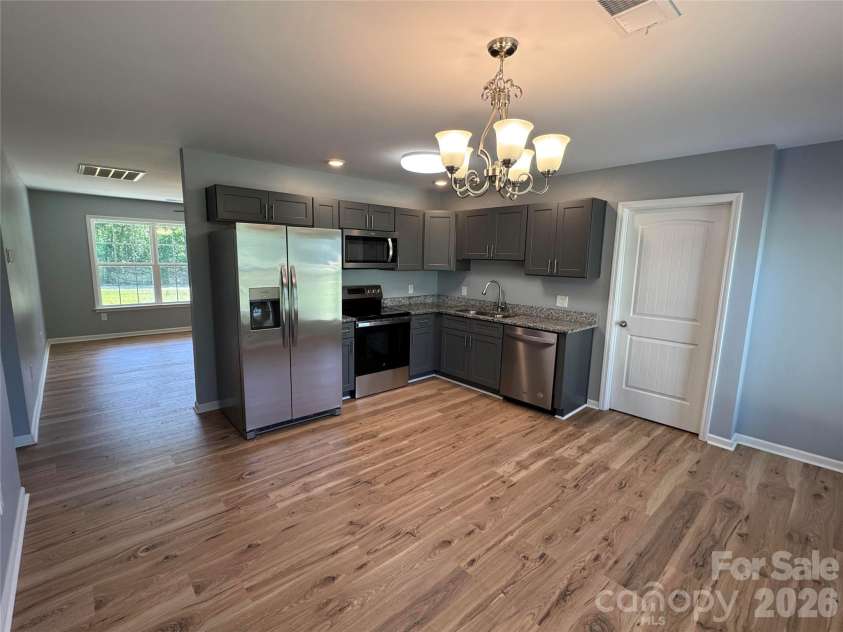 1524 Evans Mill Road, Pageland, SC 29728.  MLS# CAR4379163, YatesRealty ID 23560. New Pergo Laminate flooring