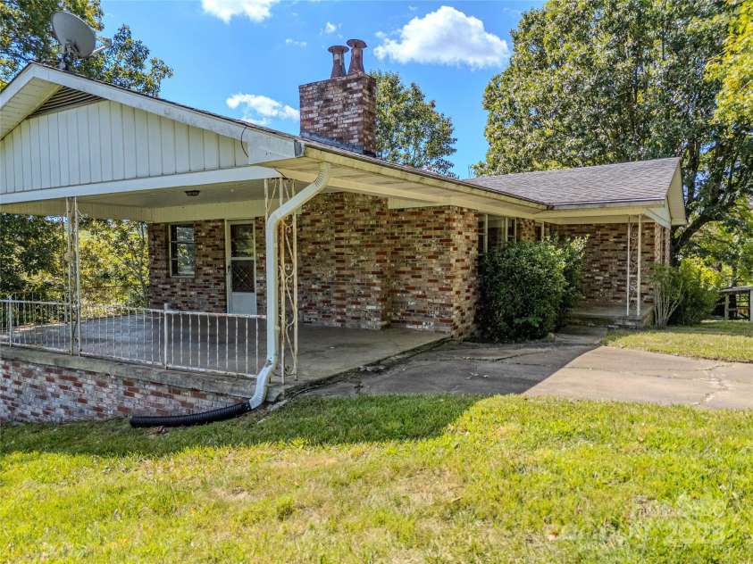56 Gill Branch Road, Weaverville, NC 28787.  MLS# CAR4270678, YatesRealty ID 23563. Cool mid-century style layout and carport.
