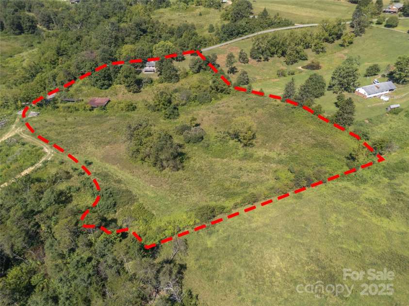 56 Gill Branch Road, Weaverville, NC 28787.  MLS# CAR4270678, YatesRealty ID 23563. Parcel outline is approximate.