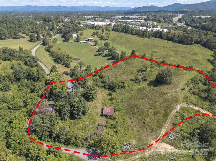 56 Gill Branch Road, Weaverville, NC 28787.  MLS# CAR4270678, YatesRealty ID 23563. Parcel outline is approximate but based on the new survey.