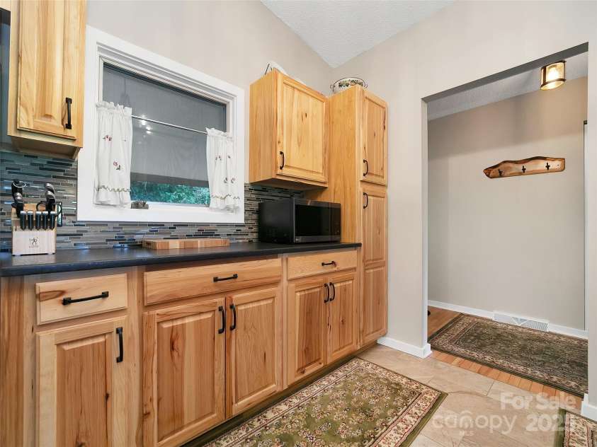 44 Falls Creek Road, Pisgah Forest, NC 28768.  MLS# CAR4302590, YatesRealty ID 23565. 