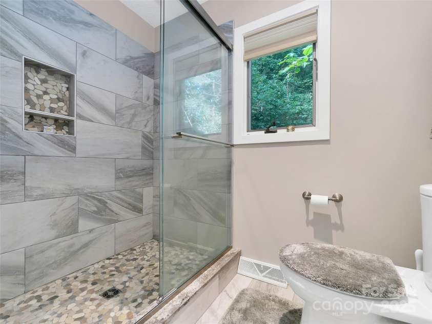 44 Falls Creek Road, Pisgah Forest, NC 28768.  MLS# CAR4302590, YatesRealty ID 23565. 