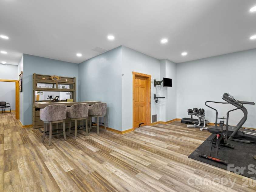 167 Wild Orchid Trail, Bryson City, NC 28713.  MLS# CAR4378989, YatesRealty ID 23568. Finished Basement