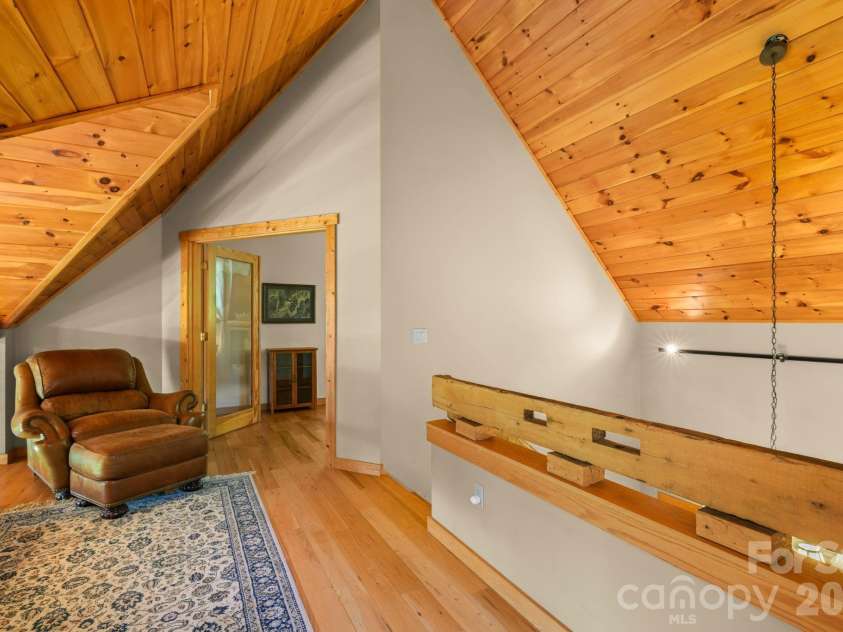 167 Wild Orchid Trail, Bryson City, NC 28713.  MLS# CAR4378989, YatesRealty ID 23568. Sitting Area in Loft