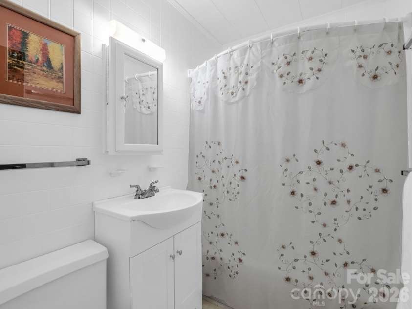 126 Sleeping Bear Lane, Lake Lure, NC 28746.  MLS# CAR4276702, YatesRealty ID 2357. 