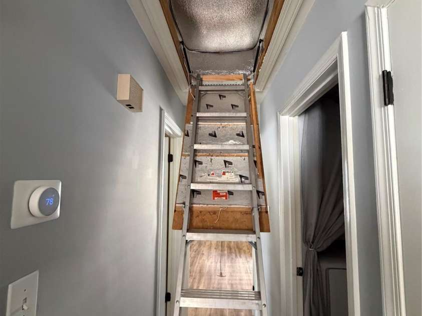 8521 Castle Pine Court, Charlotte, NC 28226.  MLS# CAR4393841, YatesRealty ID 23576. Attic pulldown staircase