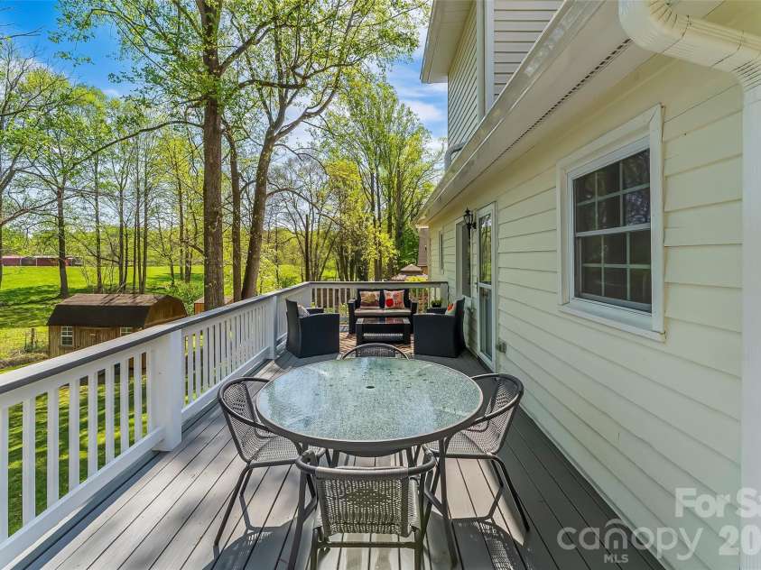 1548 Castell Lane, Hickory, NC 28601.  MLS# CAR4378823, YatesRealty ID 23578. Back deck with ample area of relaxation