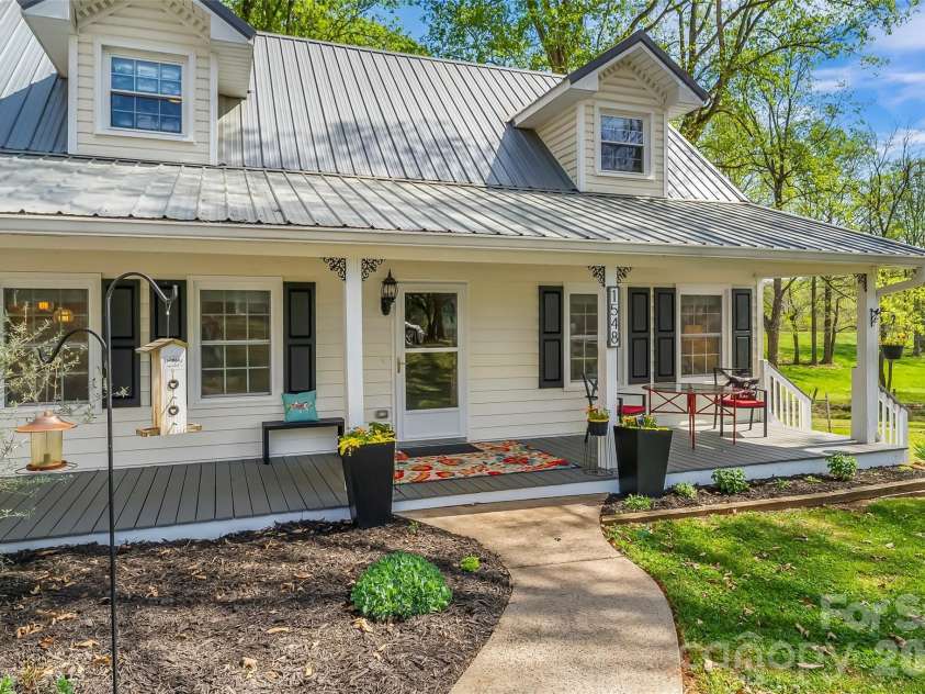 1548 Castell Lane, Hickory, NC 28601.  MLS# CAR4378823, YatesRealty ID 23578. Covered front porch for morning relaxation